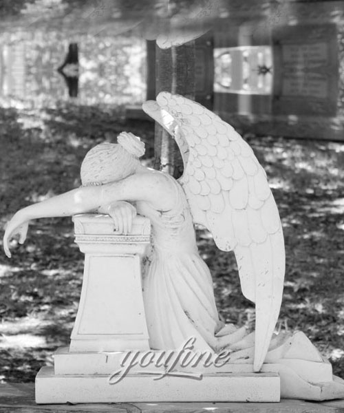 White marble weeping angel tombstone with memorial benches to buy